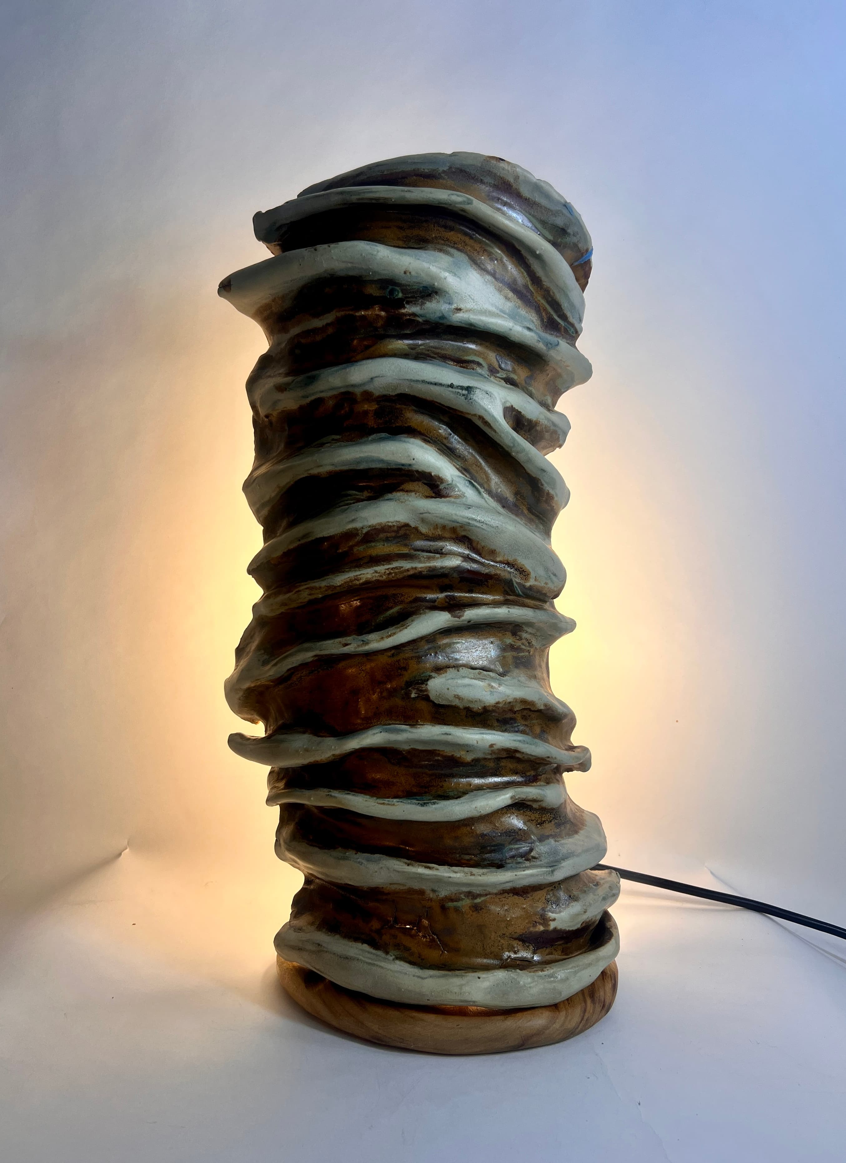 Muddy waters ceramic table sconce by J9 Stanton.